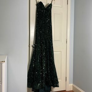 This is a sequin dark green dress that is so simple but makes you know